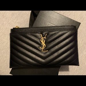 Authentic never before used YSL wristlet!